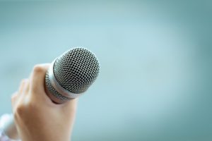 person holding a microphone