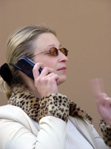 Woman in a discussion on the phone