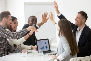 Team of business people connecting in a meeting through stories