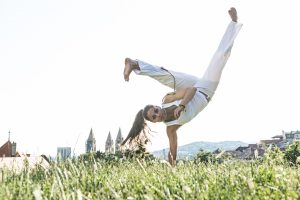 Capoeira woman, awesome stunts in the outdoors