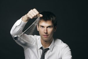 Businessman practicing the art of persuasion 